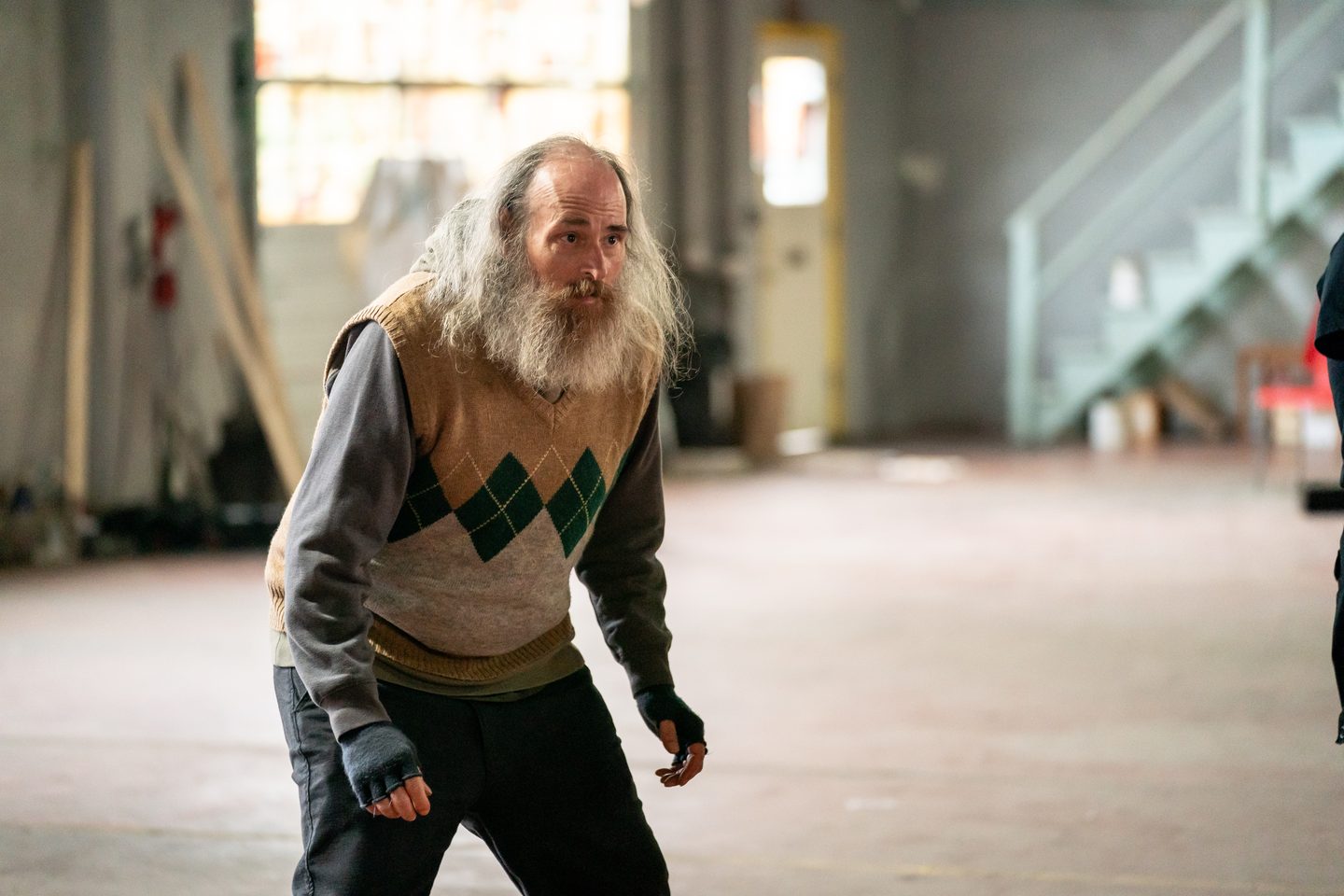 Leland (Kevin Michael Moore) directs an action scene